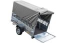 Grande remorque UNITRAILER Garden Trailer 230 KIPP avec rehausses grillagées, bâche haute et roue jockey